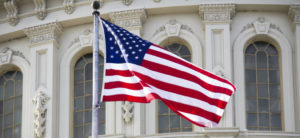 Flag and U.S. capitol building