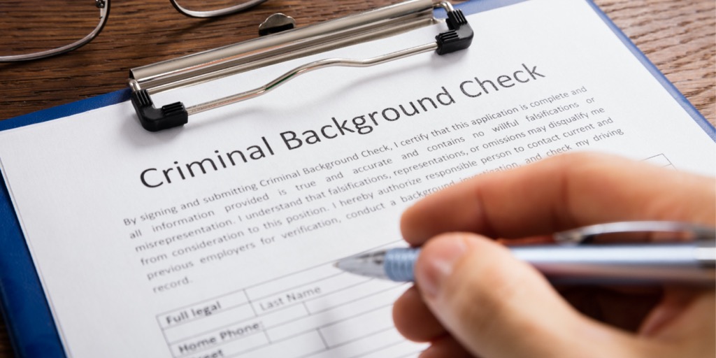 Person filling out criminal background check